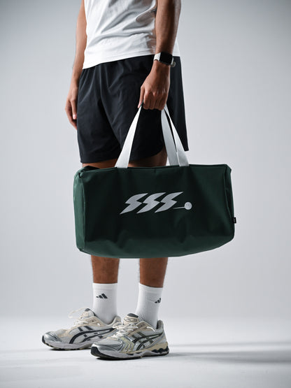 A dark green duffel bag with white handles and a white stylized 'SSS' logo.